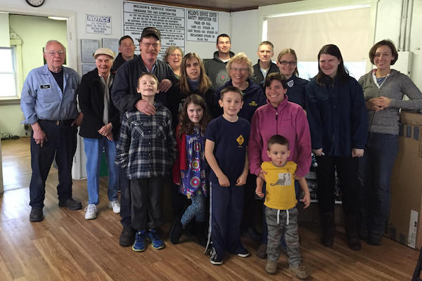 Melson family at the auto repair shop