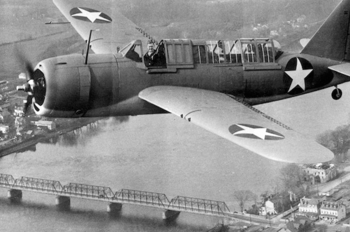 Vintage picture of plane flying over the Lambertville and New Hope bridge